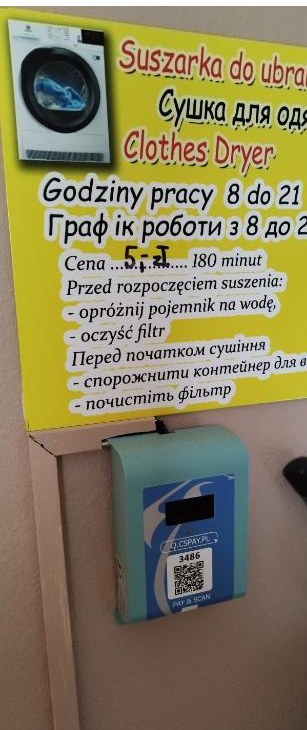 Tablica informacyjna i automat czasowy do płatnej suszarki bębnowej